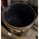 A brass coal bucket