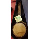 A vintage cased Keech banjolele