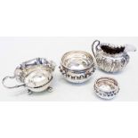 Two silver cream jugs - sold with rounded base silver bowls with beaded decoration