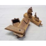 A carved wood automaton of a bear and a rabbit - sold with a Pitcairn Islands puzzle box