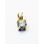 An 18ct. gold diamond solitaire pendant