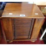 A Victorian mahogany coin collector's cabinet with eighteen fitted drawers, some with original