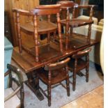 A 20th Century varnished pine draw-frame refectory style dining table with thick sectional top,