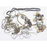 Various silver and white metal chains, charms bracelet, etc.