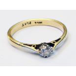 A marked 18ct./PLAT small diamond solitaire ring