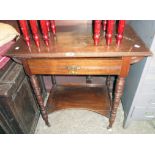 A 30" Edwardian walnut two tier side table with drawer and turned supports - top a/f