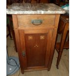A 17 3/4" early 20th Century Vienna Secession stained oak and inlaid pot cupboard with marble top,