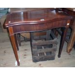 A 32" early 19th Century mahogany and strung fold-over card table with serpentine front drawer to