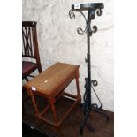 A 20th Century black painted wrought iron adjustable torchère stand - sold with an oak tea table