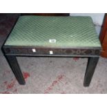 A 1920's stained wood Chippendale style dressing stool with blind fret-work decoration and drop-in