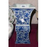 A Japanese blue and white faceted vase - chipped