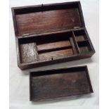 A stained wood stationery box with fitted interior and secret drawer
