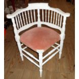 An Edwardian later painted spindle back corner chair