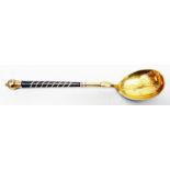 A Russian silver gilt teaspoon with niello work to bowl back and part anodised twist stem - M.K.