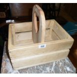 A 14" modern pine basket with heart pierced handle