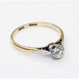 An 18ct. gold and platinum diamond solitaire ring