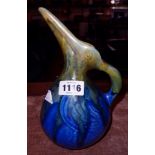 A Gilbert Metenier pelican shaped jug