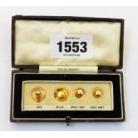 A fitted cased set of four marked 9ct. yellow metal collar studs