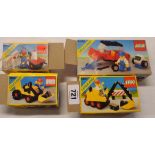 Four 1980's Lego Classic Town sets comprising Shovel Truck 6603, Road Repair Set 6606, Steam