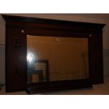 A 3' 10 1/2" modern stained wood framed hall mirror with bevelled oblong plate, four flanking coat