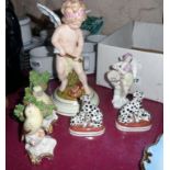 A small collection of continental decorative ceramic figures, birds and dogs - various makers