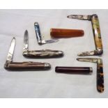 Five vintage penknives and two cheroot holders
