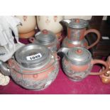 A Chinese Yixing pewter mounted tea set