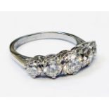An unmarked white metal five stone diamond ring - 2.04ct. TDW