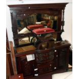 A 5' Edwardian walnut mirror back sideboard with three bevelled plates, flanking decorative turned