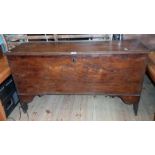 A 3' 9 1/2" antique elm coffer with later stamped heart motif and date 1836 - replacement hinges,