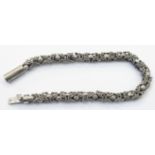 An Egyptian white metal fancy link bracelet