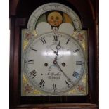 A 19th Century flamed mahogany cross banded and beaded longcase clock, the 13" painted arched dial