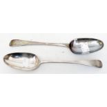 A pair of Georgian silver table spoons with stem marks and armorial to terminals
