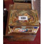 A vintage tin sold with two wooden boxes
