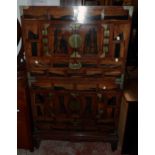 A 33 1/4" Korean hardwood and metal mounted two part cabinet with two pairs of doors and dummy