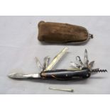 A late 19th Century French multi-blade and tool penknife with tortoiseshell effect grip, by