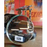 An adjustable table magnifier