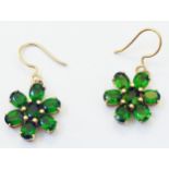 A pair of green garnet set flower head pattern drop ear-rings