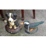 Two painted cast iron door stops; a duck and a collie