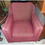 A Marks and Spencer 2002 Art Deco style armchair, upholstered in red material