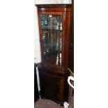 A 27" reproduction mahogany corner cabinet with glazed and mirrored top section over a cupboard