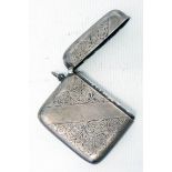 A silver vesta case