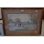 Arthur Suker: a gilt framed watercolour, depicting a rural stone bridge with church in distance -