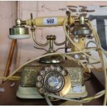 A gilt and ivorine telephone in the antique style