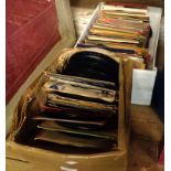 A collection of vinyl 45rpm records and EP's including Tom Jones, Carpenters, Andy Stewart, etc.