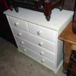 A 33" modern painted pine chest of two short and three long drawers, set on bun feet