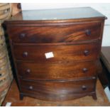 An 11" 20th Century miniature bow front chest of four long graduated drawers, set on bracket feet