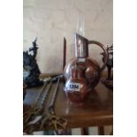 A small Jersey can, copper jug, oil lamp and three toasting forks