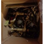A quantity of decorative brass doorknobs, door bolts and a pair of brass bath taps