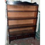 A 36" late Regency stained pine five shelf waterfall bookcase with two short drawers under set on